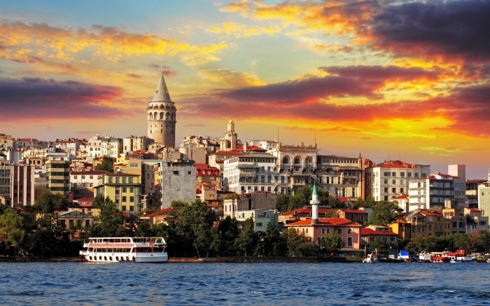 Galata Tower and Istanbul skyline at sunset