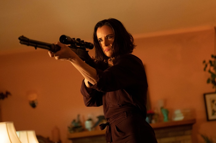 Shauna from Yellowjackets with a rifle