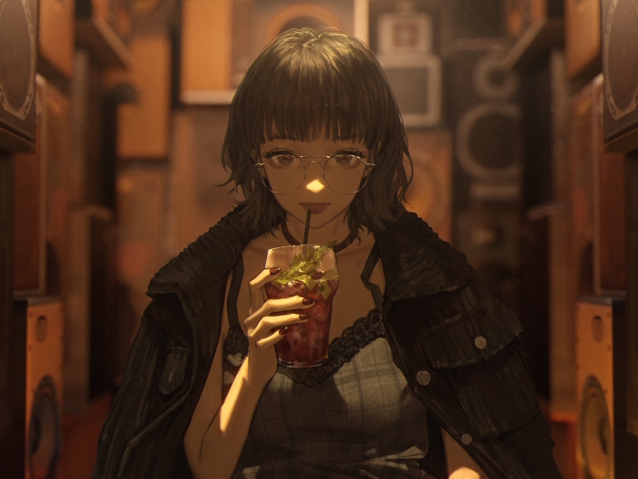 Girl drinking a beverage with ice and mint