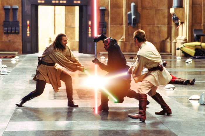 Darth Maul, Obi-Wan Kenobi, and Qui-Gon Jinn duel with lightsabers