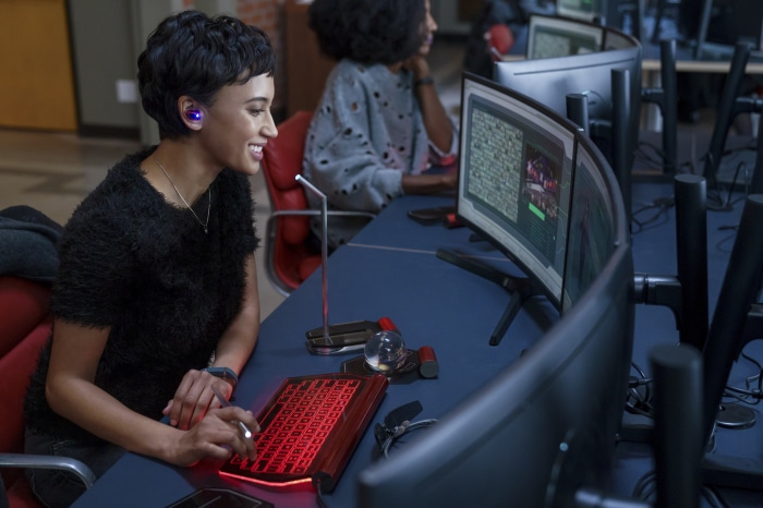 Andy Allo working on a computer