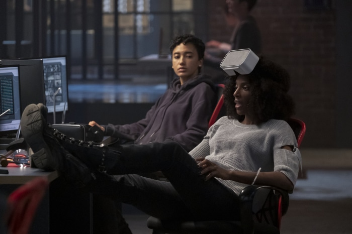 Zainab Johnson and Andy Allo in a dark room