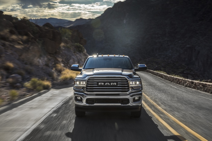 Ram 2500 HD truck driving on a mountain road