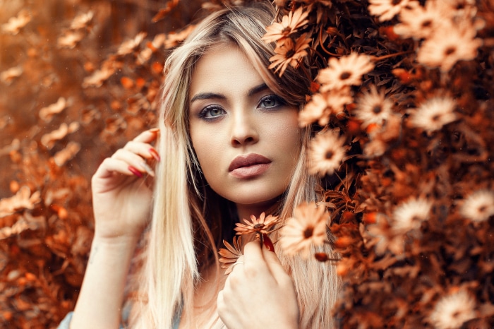 Woman with blonde hair and flowers
