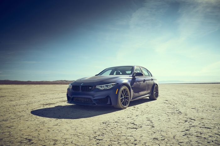 Blue BMW M3 Sedan on Cracked Earth