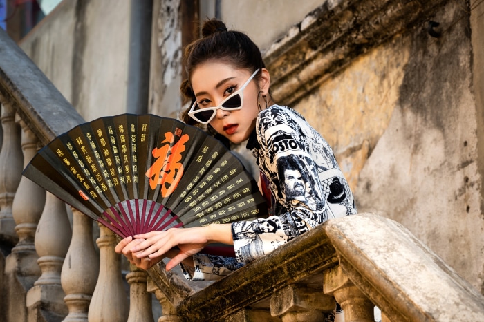 Asian woman with fan