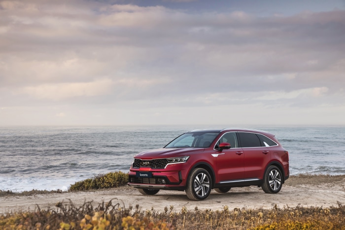 Red Kia Sorento CRDi AWD SUV by the Ocean