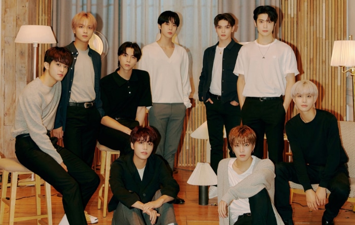 NCT members posing for a group photo