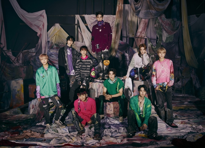 NCT members in a stylized setting