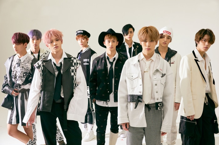 NCT members posing for a group photo