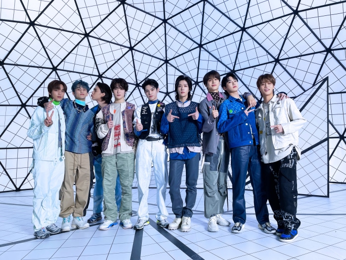 NCT members posing for a group photo