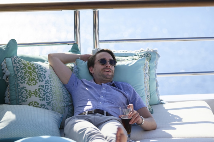 Man relaxing on a yacht in Succession 4K