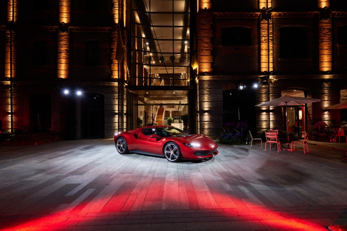 Red Ferrari 296 GTB Supercar at Night
