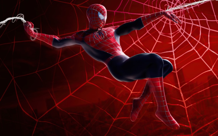 Spider-Man swinging on a web