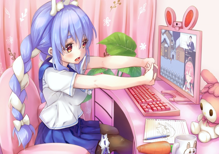 Usada Pekora from Hololive stretching at her desk