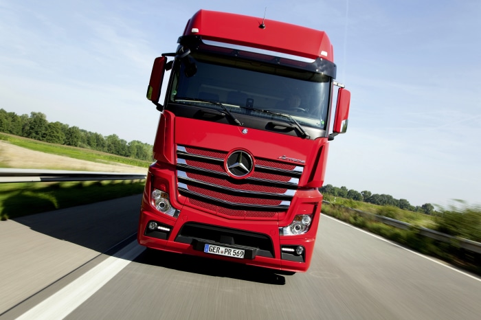 Red Mercedes-Benz Actros Truck on Road 4K