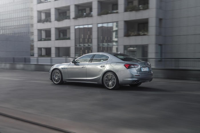 Silver Maserati Ghibli GT Hybrid driving
