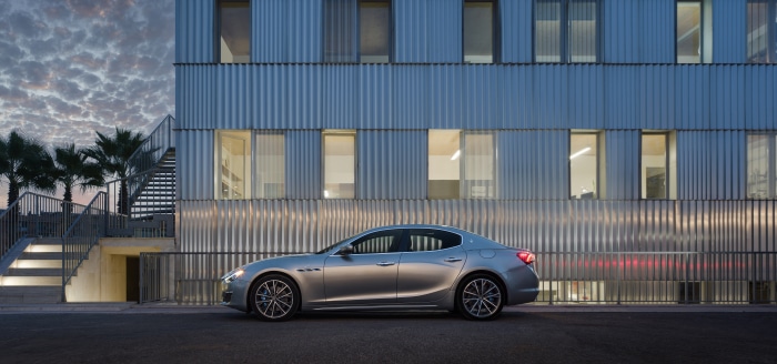 Maserati Ghibli GT Hybrid parked by modern building