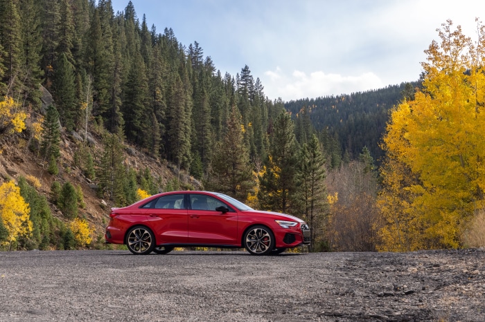 Red Audi A3 Sedan on a Mountain Road