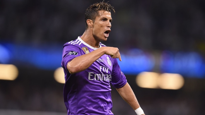 Cristiano Ronaldo in a purple Real Madrid jersey