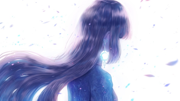 Girl with long dark hair and earrings