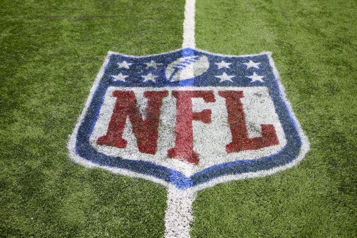 NFL logo on a football field
