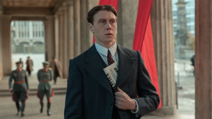 Man in Suit with Newspaper in Munich: The Edge Of War 4K