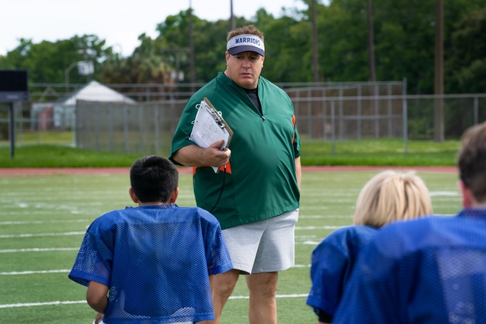 Kevin James as Coach on Football Field
