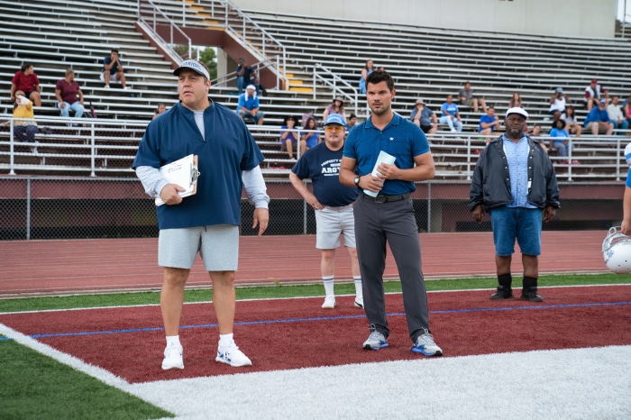 Kevin James and Taylor Lautner on Football Field
