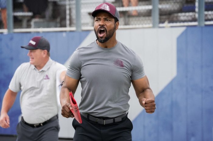 Coach yelling on a field