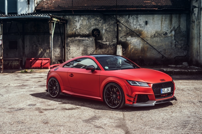 Red Audi TT RS-R parked in an industrial area