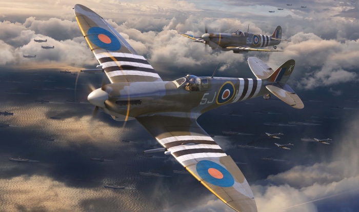 Supermarine Spitfires flying over a fleet