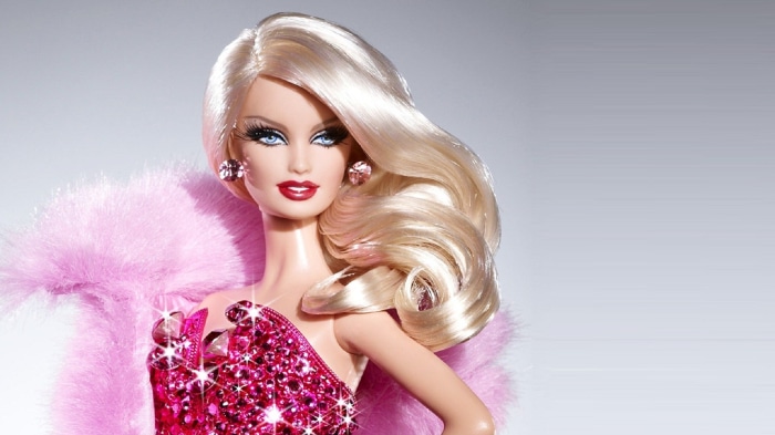 Barbie doll in pink dress and fur stole