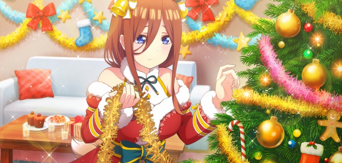 Miku Nakano decorating a Christmas tree