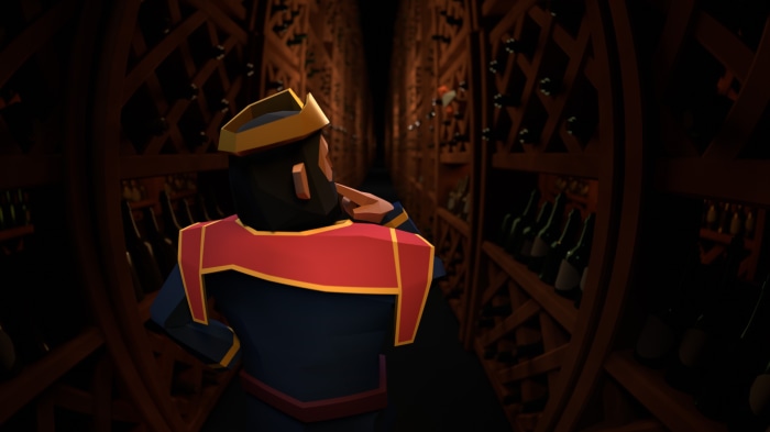 Man in crown in wine cellar