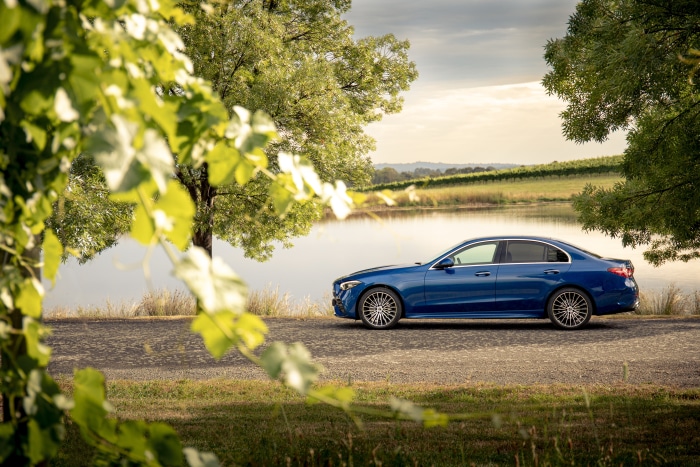 Mercedes-Benz C 300 AMG Line sedan by a lake