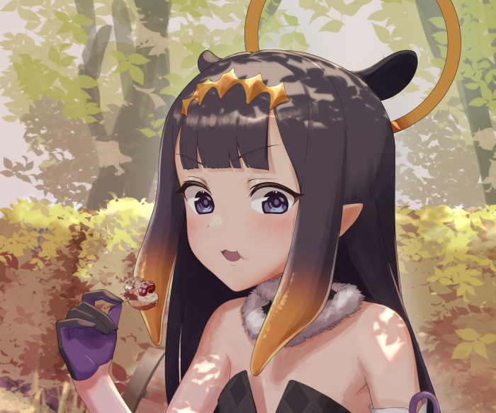 Ninomae Ina from Hololive eating a small dessert