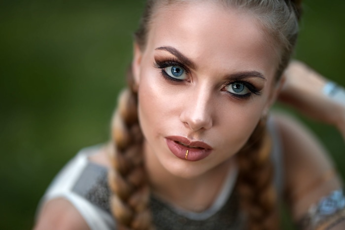 Woman with blue eyes and braided hair