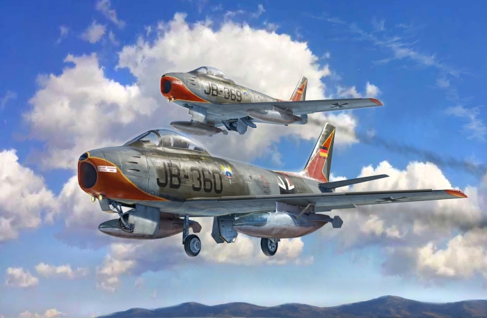 Two North American F-86 Sabre fighter jets in flight