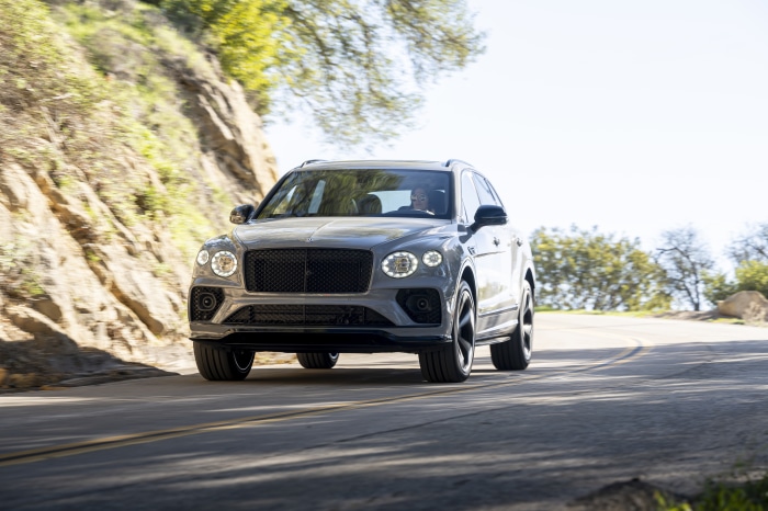 Bentley Bentayga S SUV driving on a winding road