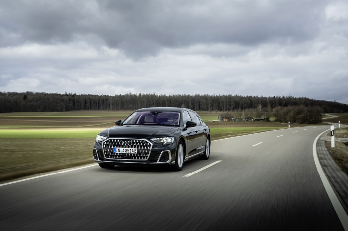 Audi A8 L 60 TFSI e quattro S line driving on road