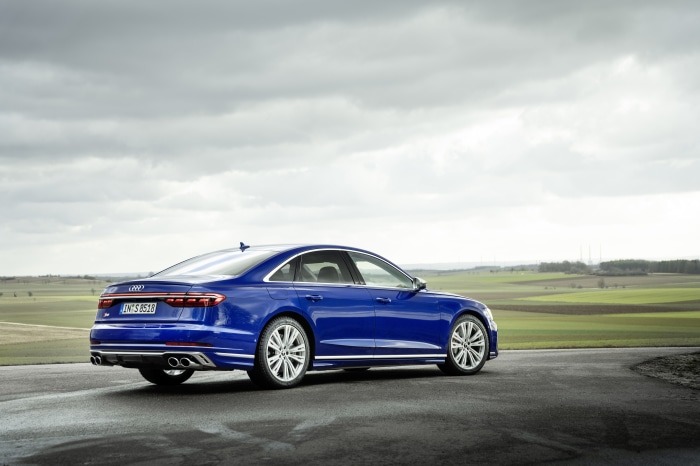 Blue Audi S8 sedan on a road