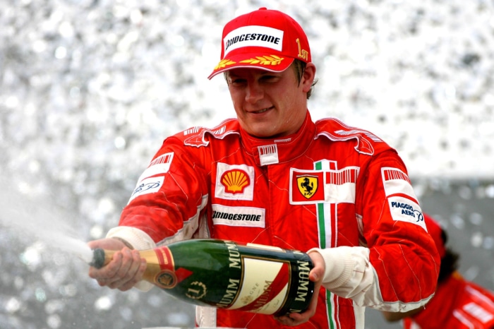 Kimi Räikkönen celebrating with champagne