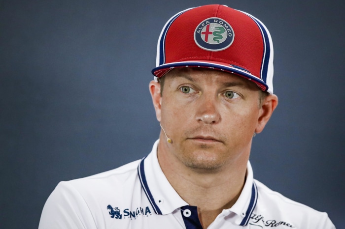 Kimi Räikkönen wearing Alfa Romeo cap