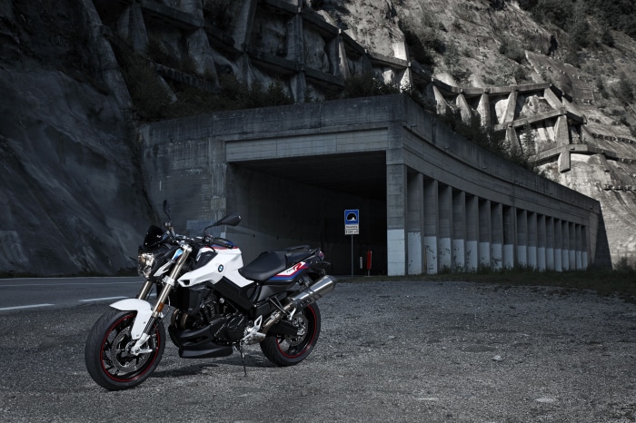 BMW F800R motorcycle parked near tunnel entrance
