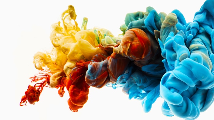 Abstract Fluid Art with Yellow, Red, and Blue Ink