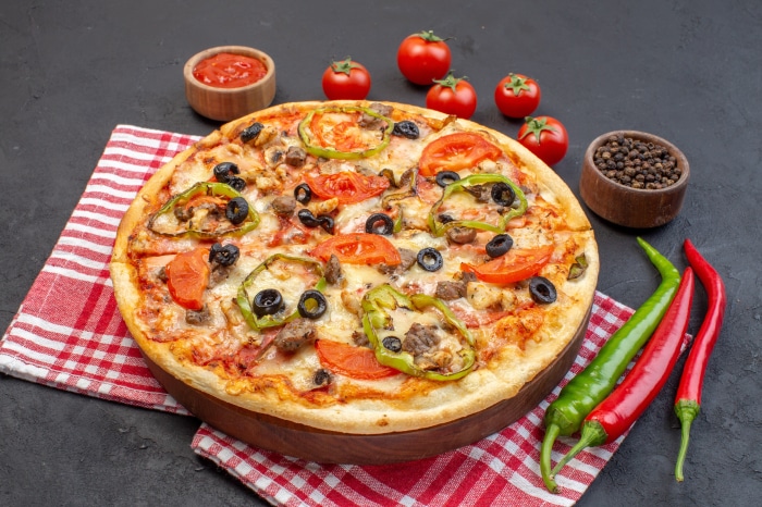 Pizza with toppings and ingredients