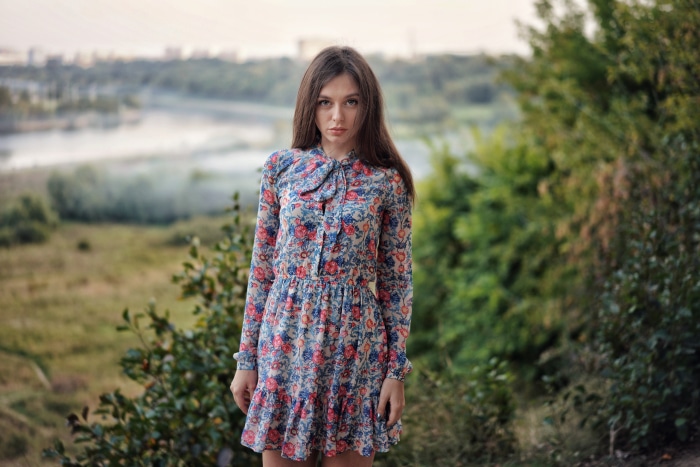 Woman in floral dress outdoors