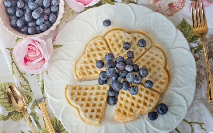 Waffle with blueberries and flowers