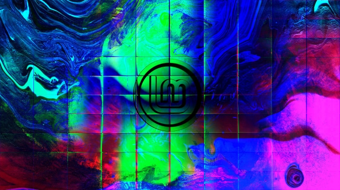 Linux Mint logo on abstract colorful background